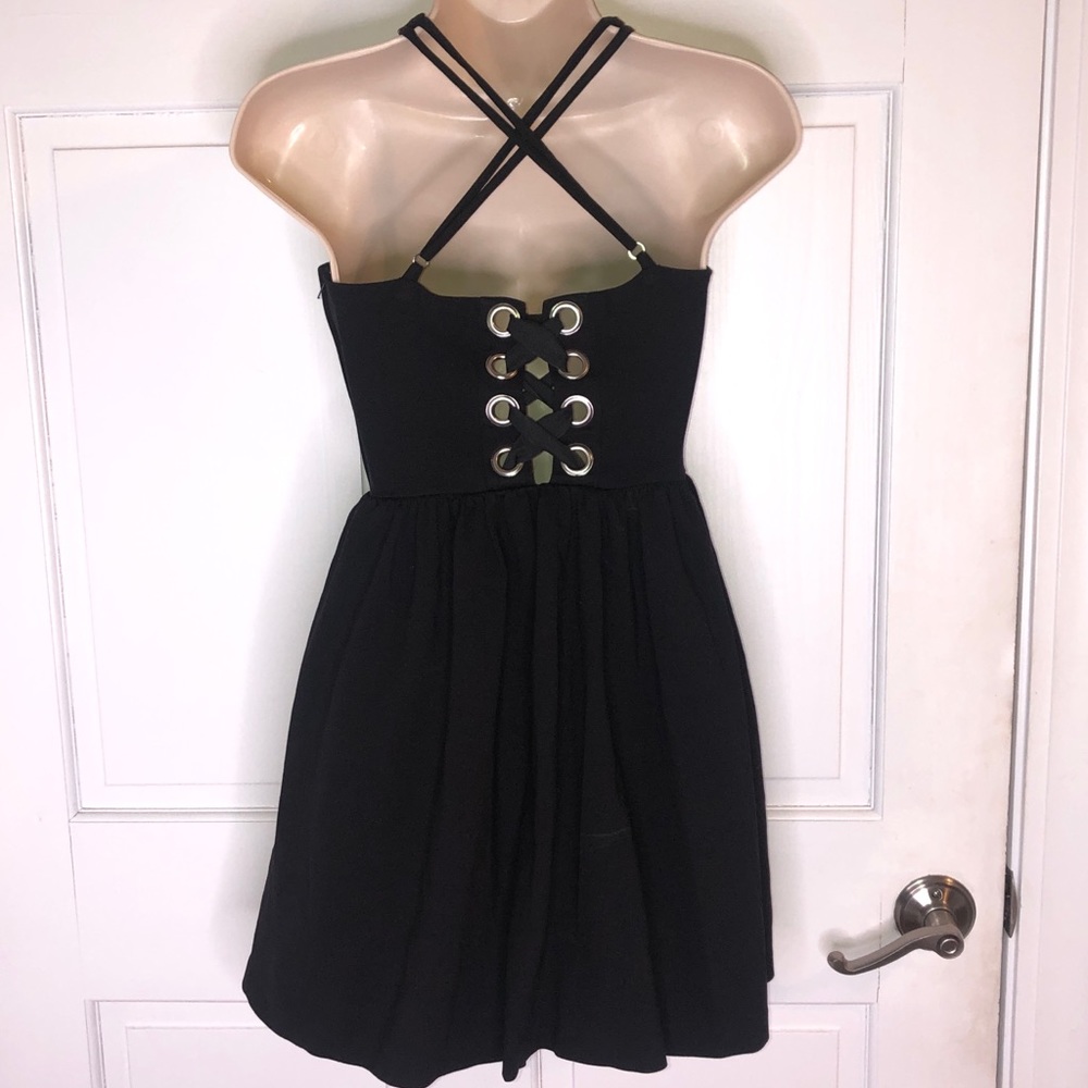 Guess LBD crisscross back side zipper size 2